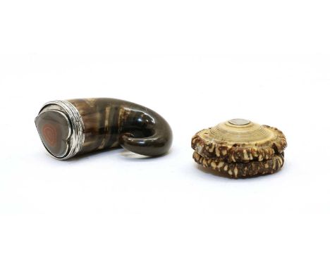 A horn snuff box, with a silver mount and heart shaped agate mount to the hinged cover, 8cm high, and an antler sniff box, 6.
