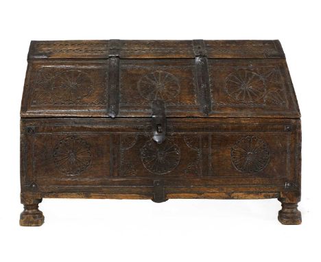 An Indian Rajasthan oak dowry box, 19th century, with iron mounts and carved roundels, 42cm long, 23cm deep, 28cm highConditi