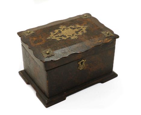 A Victorian two-compartment tea caddy, with all-over grained decoration, the shaped top with metal mounts, 17cm wide, 10.5cm 