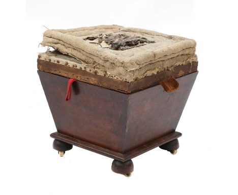 A mahogany ottoman stool, 19th century, the sprung and upholstered hinged top above a tapering square body, raised on bun fee