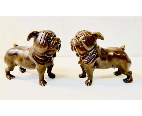 SCULPTURAL BULLDOGS, a pair, in bronze, 29cm H x 38cm L (2) 