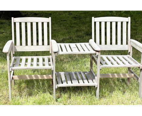 GARDEN CONVERSATION BENCH, well weathered teak, two armchairs with conjoining table, 162cm W. 