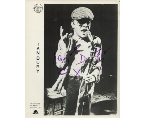 Ian Drury signed 10x8 inch vintage black and white promo photo. Ian Robins Dury (12 May 1942 27 March 2000) was a British sin