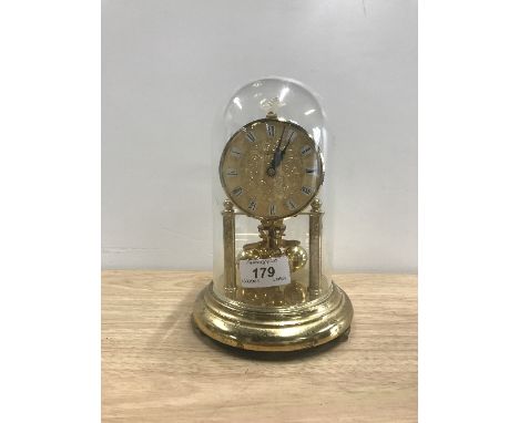 SKELETON CLOCK IN GLASS DOME