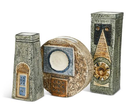 A group of three Troika vases, circa 1970s, to include a Sue Lowe coffin vase, 17.5cm high; an Avril Bennett wheel vase, 16cm