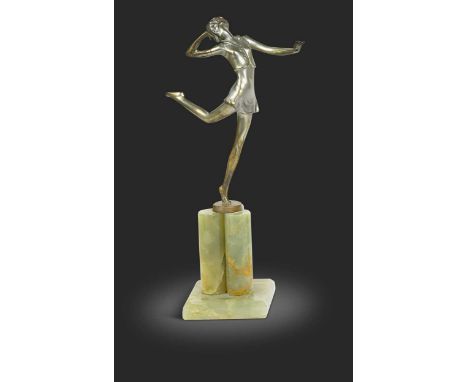Josef Lorenzl (1892-1950), an Art Deco silvered bronze model of a dancer, 'Carefree', raised on a trefoil shaped onyx column 