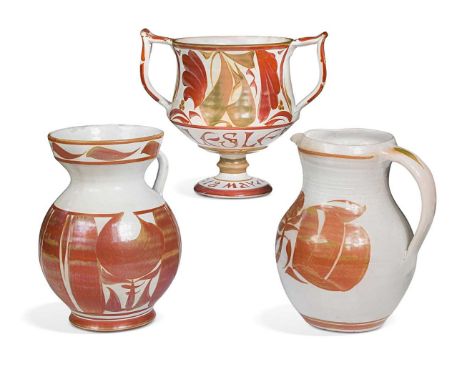 § Alan Caiger-Smith (1930-2020) for Aldermaston Pottery, two similar earthenware jugs, the tin-glazed bodies decorated with r