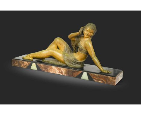 Demetre Chiparus (1886-1947), L'echo, circa 1925, a large green patinated Art Deco bronze of a reclining partially draped fem