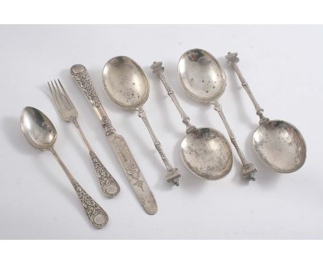 A SET OF FOUR LATE 19TH CENTURY DUTCH SPOONS with oval bowls, decorated on the back with a wreath & a windmill, and a Victori