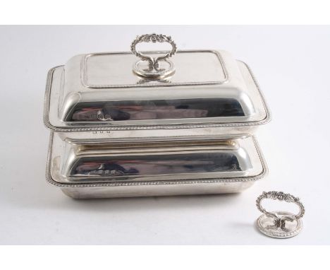 A PAIR OF MODERN OBLONG ENTREE DISHES & COVERS with gadrooned borders & detachable foliate ring handles, by D & J. Wellby, Lo