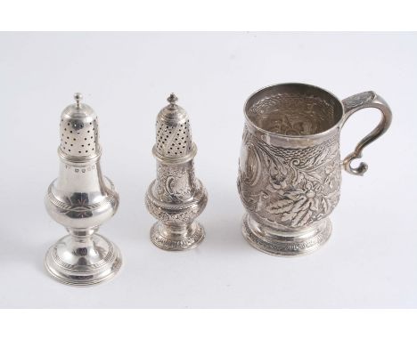 A GEORGE III SCOTTISH MUG with later-embossed decoration, crested, maker's mark "REID", Edinburgh 1762, a small George III la