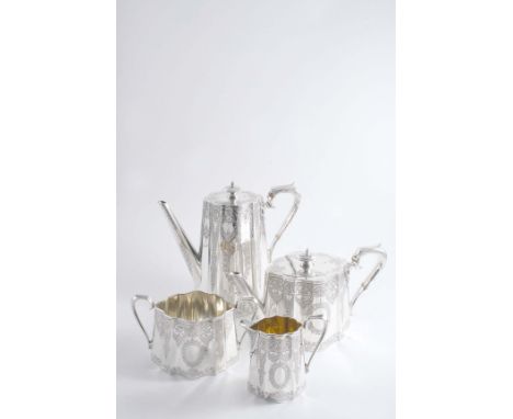 A VICTORIAN ENGRAVED FOUR PIECE TEA & COFFEE SERVICE with shaped & tapering oval bodies, the pots with flush, hinged covers, 