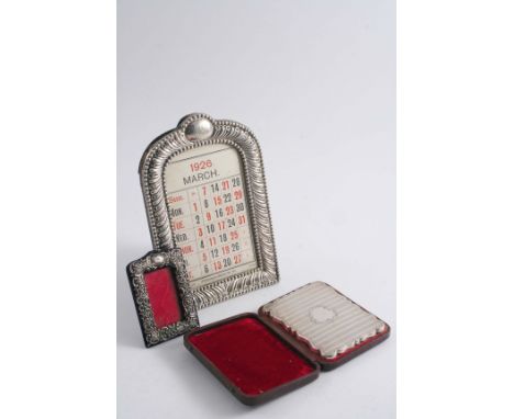 A VICTORIAN ENGINE-TURNED CARD CASE of shaped oblong outline with a vacant cartouche, by Edward Smith, Birmingham 1846 (origi