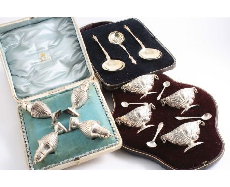 A CASED SET OF FOUR FLUTED PEPPERETTES  by G.M. Jackson, London 1893, a cased set of four late Victorian salts (with four non