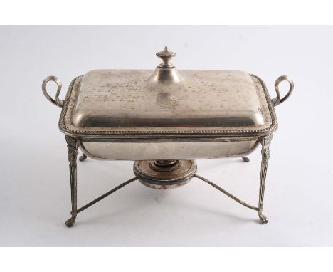 A LATE VICTORIAN OBLONG WARMING DISH with two upswept handles, a bead border & a rising cover with an urn-shaped finial, lift