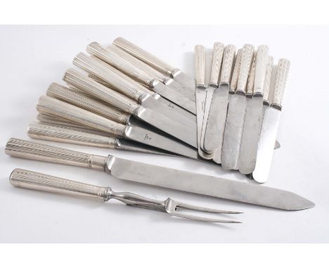 A GEORGE III / IV COLLECTED OR MATCHED SET OF FIFTEEN TABLE KNIVES and nine side knives with reeded handles (& assorted steel