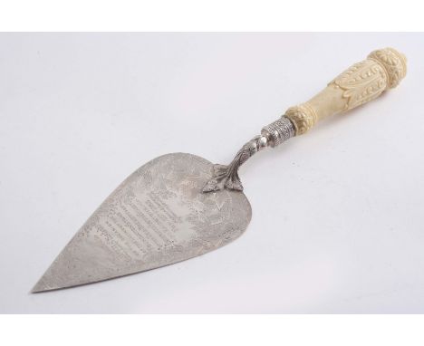 A VICTORIAN PRESENTATION TROWEL with a carved ivory handle & an inscription relating to the "New Brewery, Maidstone...1898", 