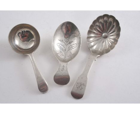 A GEORGE III OLD ENGLISH PATTERN CADDY SPOON maker's mark only, possibly by Jason Holt (of Bristol) c.1780 and two other Exet