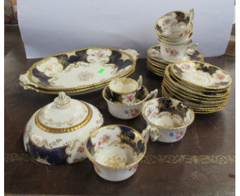 A Coalport part tea service, decorated with flowers to a gilt and blue groundCondition Report:  Tea cup badly stained, bread 