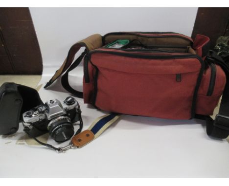 An Olympus camera, box case and accessories&nbsp;