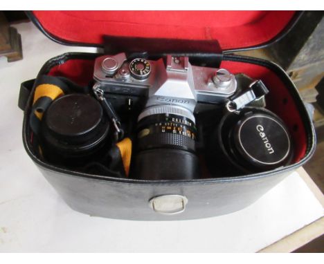 A box Cannon camera and lenses&nbsp;