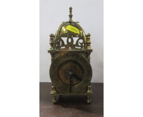 A reproduction brass lantern clock, height 7.5ins