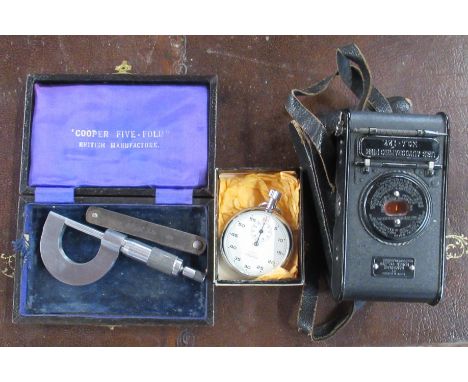 A vest Pocket Kodak camera, together with a Nero Lemania stop watch and a gauge