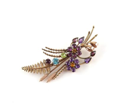 Vintage floral brooch, set with a blue zircon, peridot, amethysts, garnets and citrines, mounted in 9 ct yellow gold, hallmar