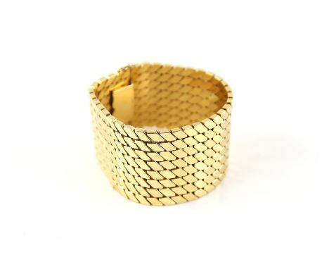 Vintage gold cuff bracelet, eight rows of fancy links, 4cm in width, concealed clasp and two figure of eight safety catches, 