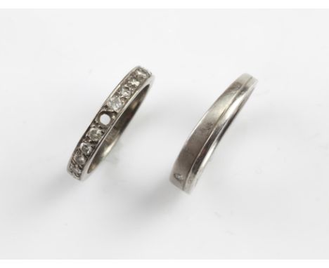 Diamond half eternity band, set with eleven round cut diamonds, estimated total diamond weight 0.33 carats, in a claw setting