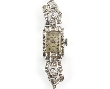 Art Deco diamond set cocktail watch, estimated total diamond weight 0.66 carat, rectangular case, tested as platinum, dial si