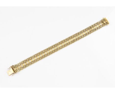 Vintage gold fancy link bracelet, with polished and textured links, stamped 18 ct, with concealed clasp and two figure of eig