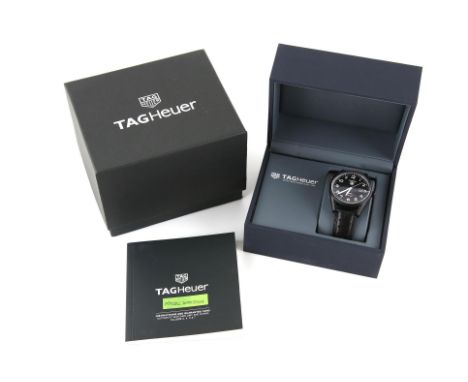 Tag Heuer, a Gentleman's Carrera calibre 5 drive time  wristwatch, the signed black dial with date at three and internal beze