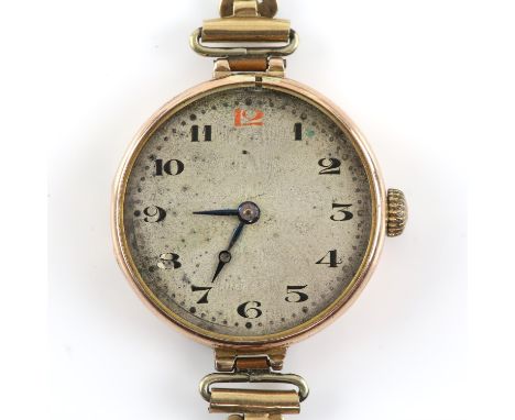 Rolex, a gold ladies wristwatch, circular silvered unsigned dial with Arabic numeral hour markers and blue steel hands, fitte
