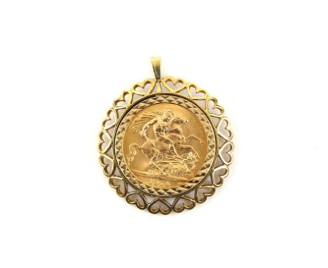 Vintage gold coin pendant mount, with open work heart motif and fixed bail, in 9 ct yellow gold, with a centrally, set with E