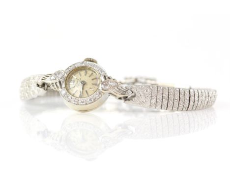 Girard Perregaux cocktail watch, with diamond set bezel, estimated total diamond weight 0.15 carats, in 14 ct white gold case