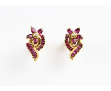 Vintage ruby and diamond earrings, floral style earrings with pear and baguette cut rubies, and central round brilliant cut d