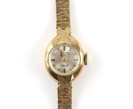 Rotary a Ladies gold wristwatch, the signed silvered circular dial with baton hour markers, fitted with a 21 jewel manual win