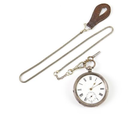 A silver open face pocket watch, the white enamel dial with Roman numeral hour markers within a railway minute track, subsidi