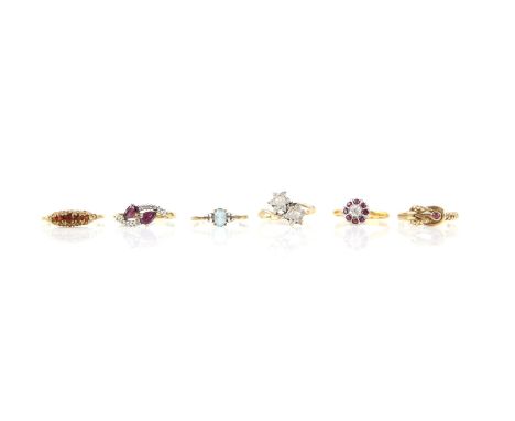 Six rings, including, ruby and diamond cluster, with illusion setting, in 18 ct yellow gold, size N, another garnet and diamo
