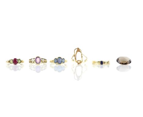 Five gem set rings, including a single stone sapphire ring, a single stone amethyst ring, a three stone opal triplet ring and