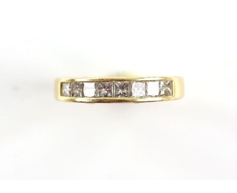 Modern princess cut half eternity ring, with eight princess cut diamonds, estimated total carat weight 0.80 carats, in 18 ct 