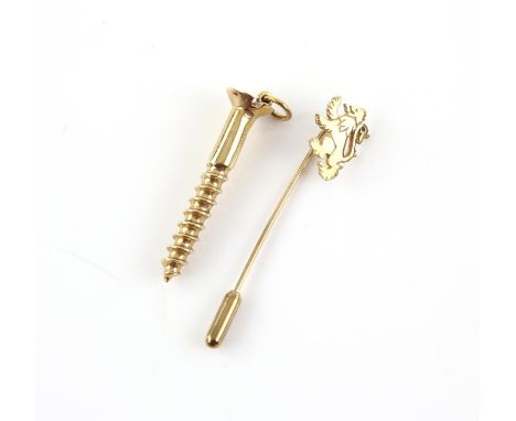 A gold pendant in the form of a screw, length estimated 4 cm in hallmarked 9 ct, London 1976, and a stick pin with the form o