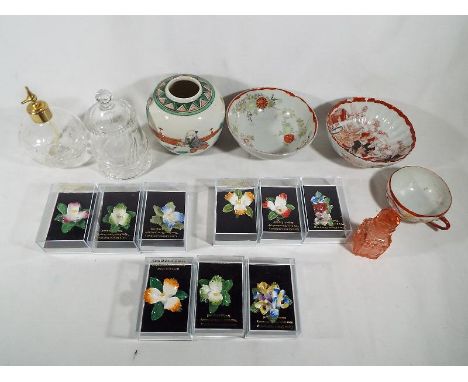 A good mixed lot to include ceramic floral brooches, perfume bottles, Asian ceramics and an unusual glass paperweight depicti