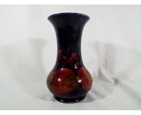 A Moorcroft Pottery large trumpet vase decorated in the Pomegranate patter, signed to the base, 19cm (h) - Est £150 - £200