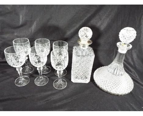 Two good quality cut glass decanters to include a ships decanter and six drinking glasses (qty) - Est £30 - £50