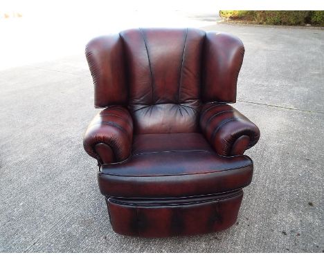 A good quality leather reclining chair 103 cm x 98 cm x 85 cm (see lot 60A for matching 3-seater sofa)