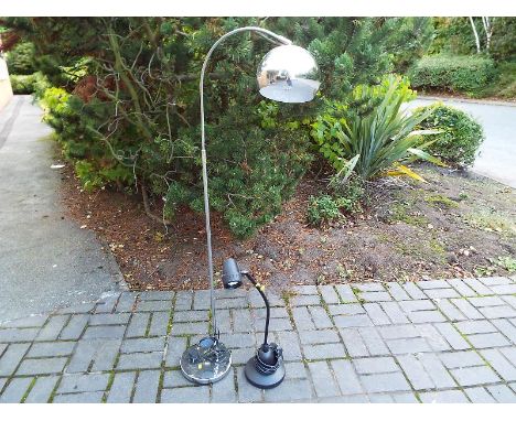 A chrome floor standing lamp and a black table top lamps (2)