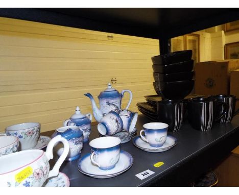 A shelf lot of tableware to include  an Oriental tea-set and an Ethos collection of tableware