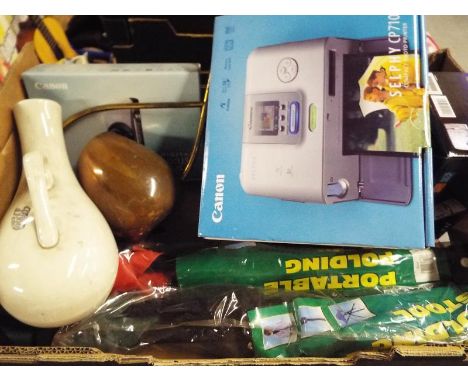 A good mixed lot to include a Canon Selphy CP710 compact photo copier, an Olympus M850SW, a Canon digital 1XUS75, two portabl